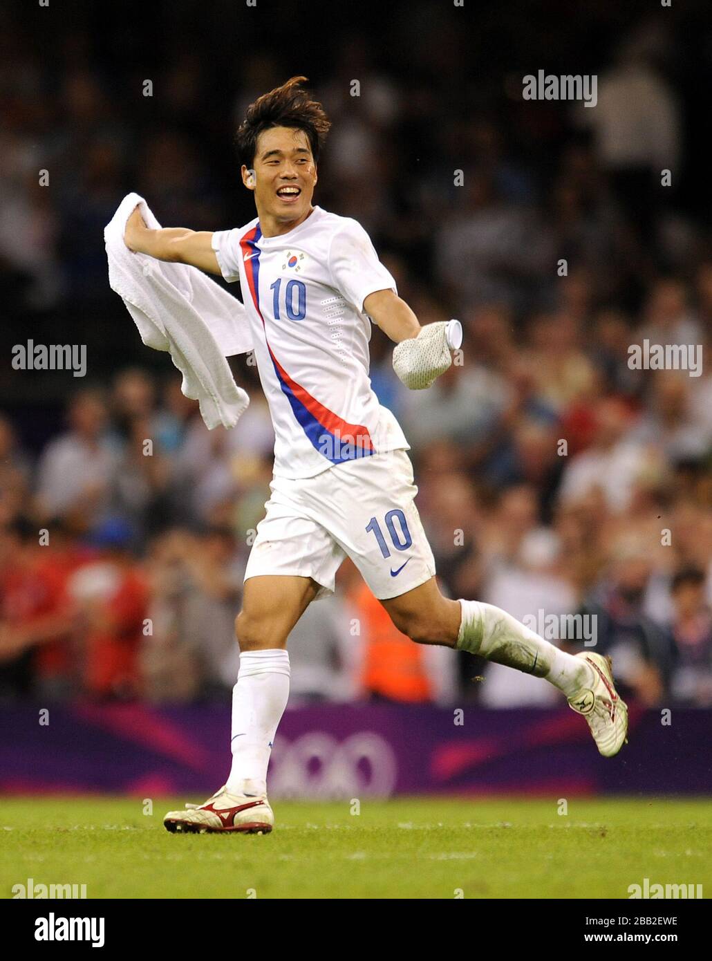 South Korea's Park Chu-Young celebrates after his side beat Japan to win the men's football Bronze medal match at the Millennium Stadium, Cardiff. Stock Photo