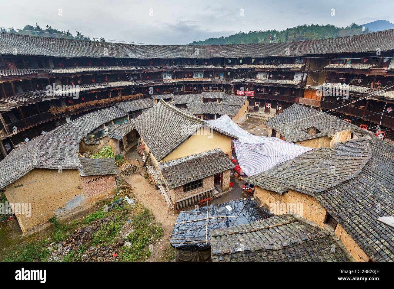 View of a so-called Tulou: traditional round houses of the Hakka people. The Fujian Tulou are a UNESCO world cultural heritage site since 2008. Stock Photo