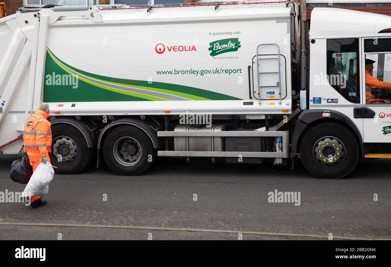 Biggin Hill, UK. 30th Mar, 2020. Waste collectors dump recycling  collections in the Borough of Bromley. The council have decided to stop all  recycling collections until further notice due to the Coronavirus.