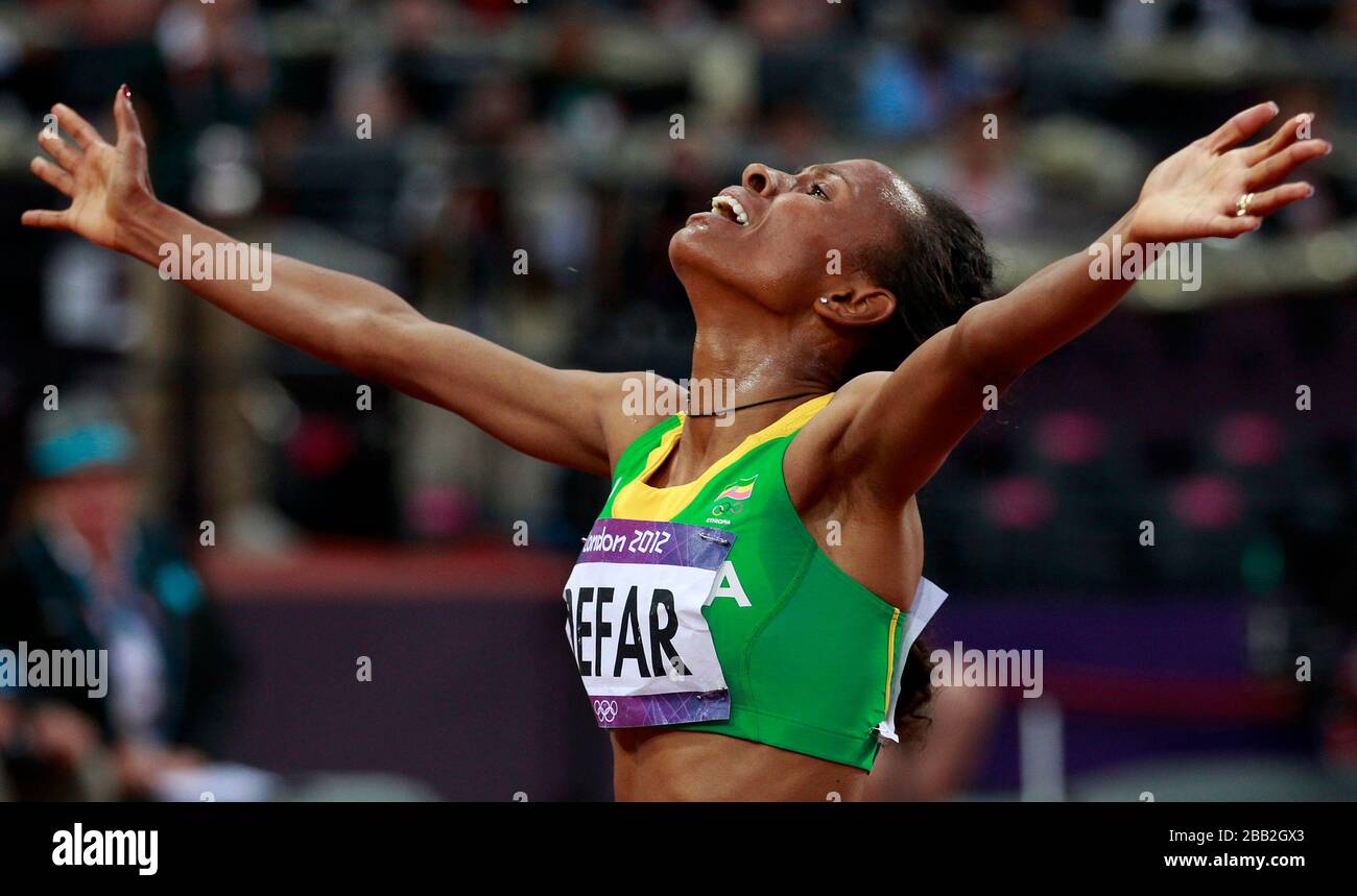 Ethiopia's Meseret Defar celebrates winning the women's 5,000 metre final  Stock Photo - Alamy