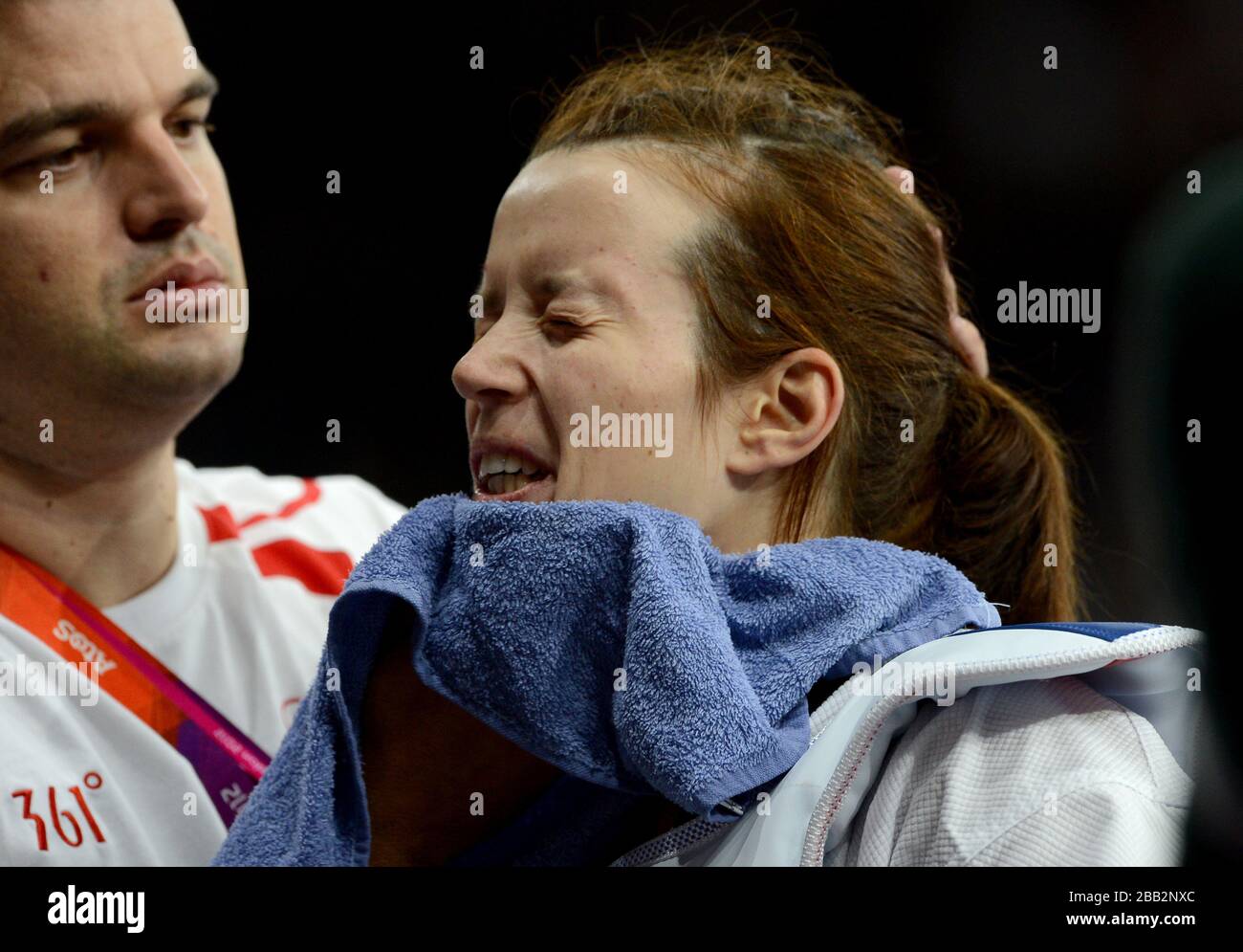 Croatia's Lucija Zaninovic receives treatment during the Women's (-49kg) Taekwondo at the ExCel centre, London Stock Photo
