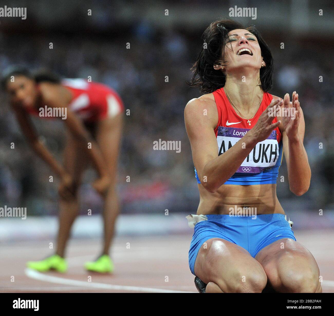 Russia's Natalya Antyukh celebrates winning the gold medal during the Women's 400m Hurdles, on the 12th day of the London 2012 Olympics at The Olympic Stadium. Stock Photo