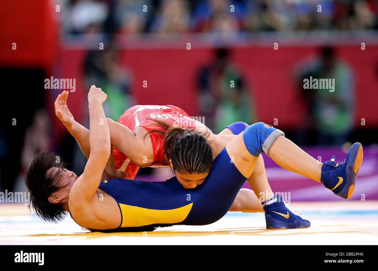 Womens wrestling olympics medal hi-res stock photography and images photo