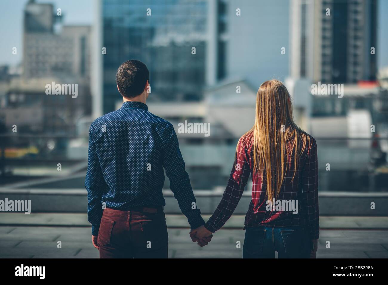 Girl guy holding hands walking hi-res stock photography and images - Alamy