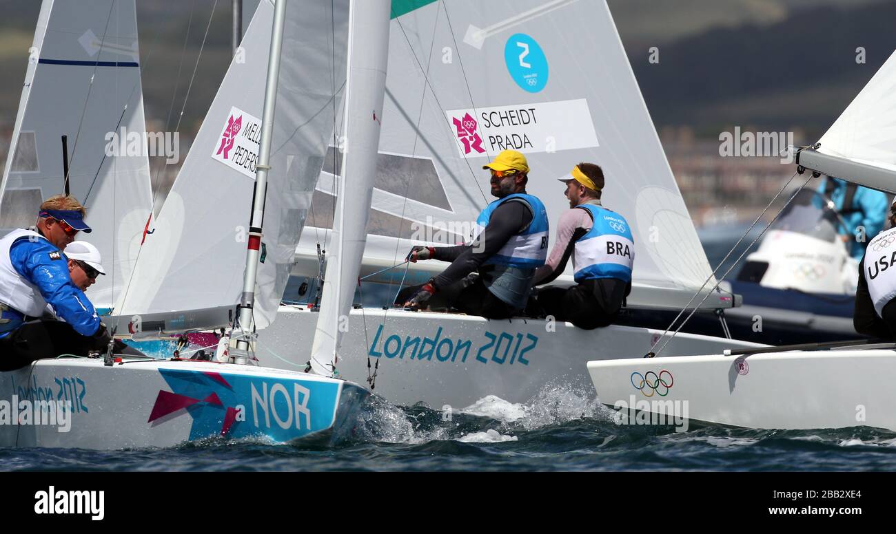 Brazil's Star sailors Robert Scheidt and Bruno Prada on a crowded windward mark during the Olympic medal race off Weymouth today. Stock Photo