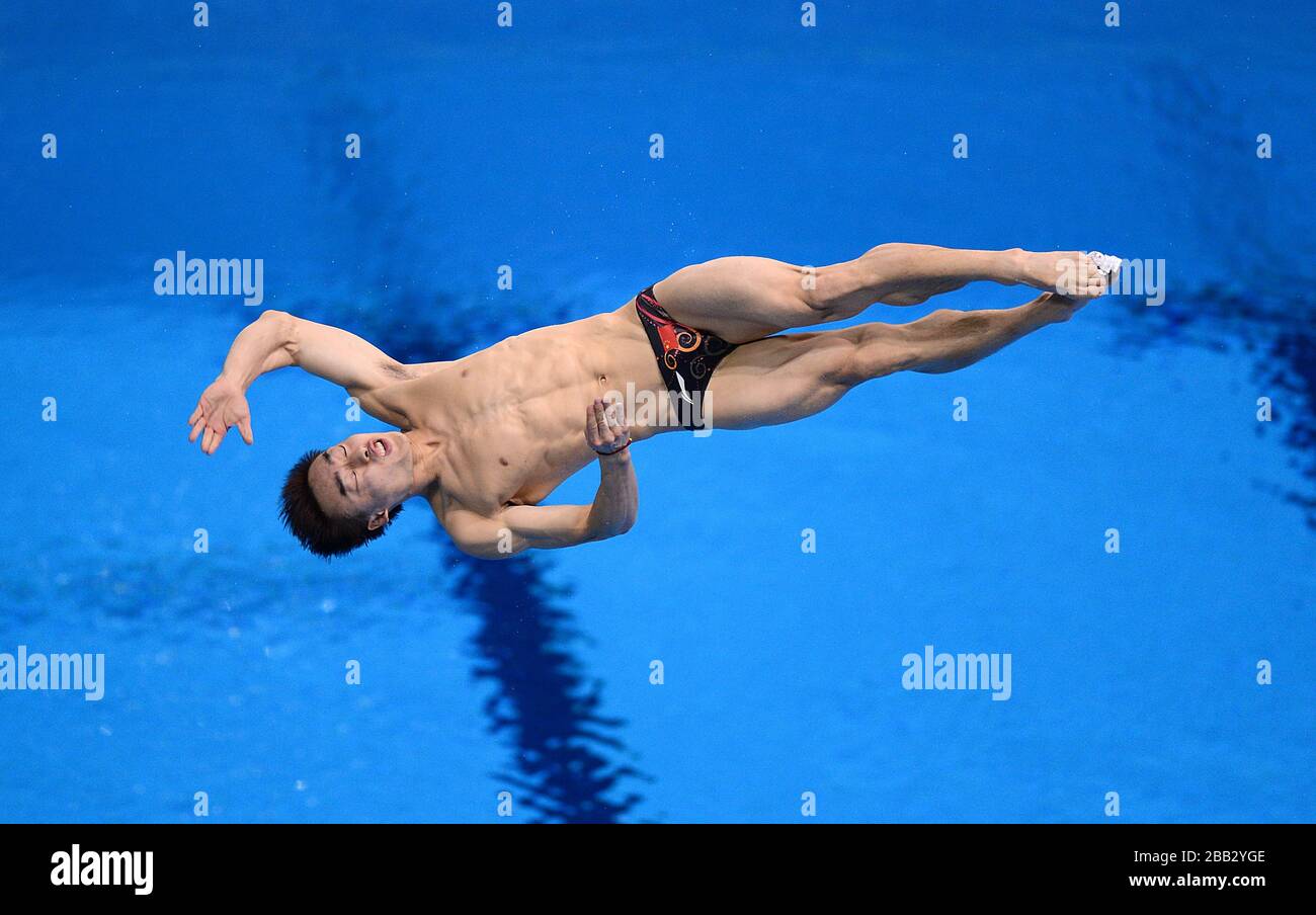 China's Kai Qin during the Men's 3m Springboard Preliminary Round Stock ...