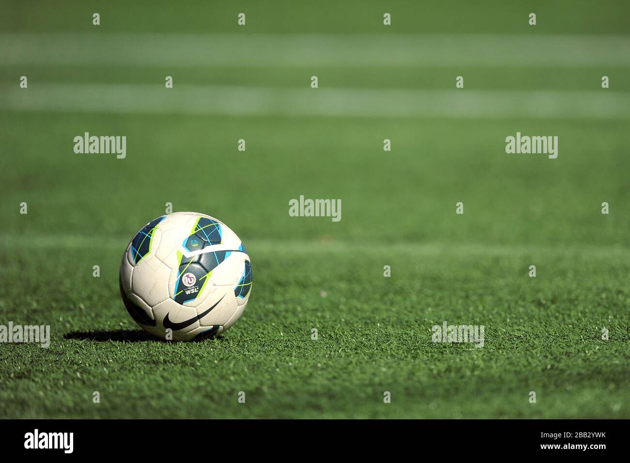 Detail of an official Nike match ball on the artificial pitch at The Select Security Stadium Halton Stock Photo
