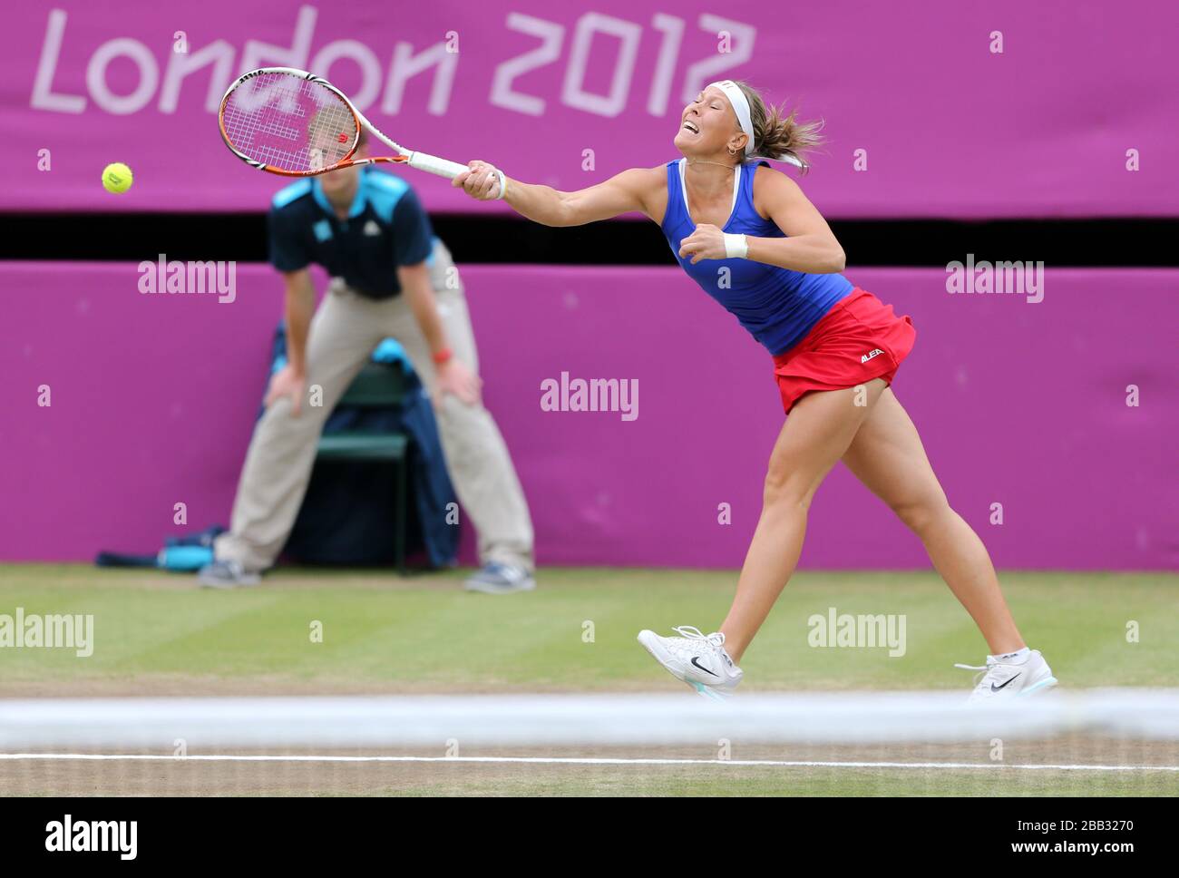 Women's tennis doubles player Lucie Hradecka of the Czech Republic in action in the final against Serena and Venus Williams  at Wimbledon at the London 2012 Olympics Stock Photo