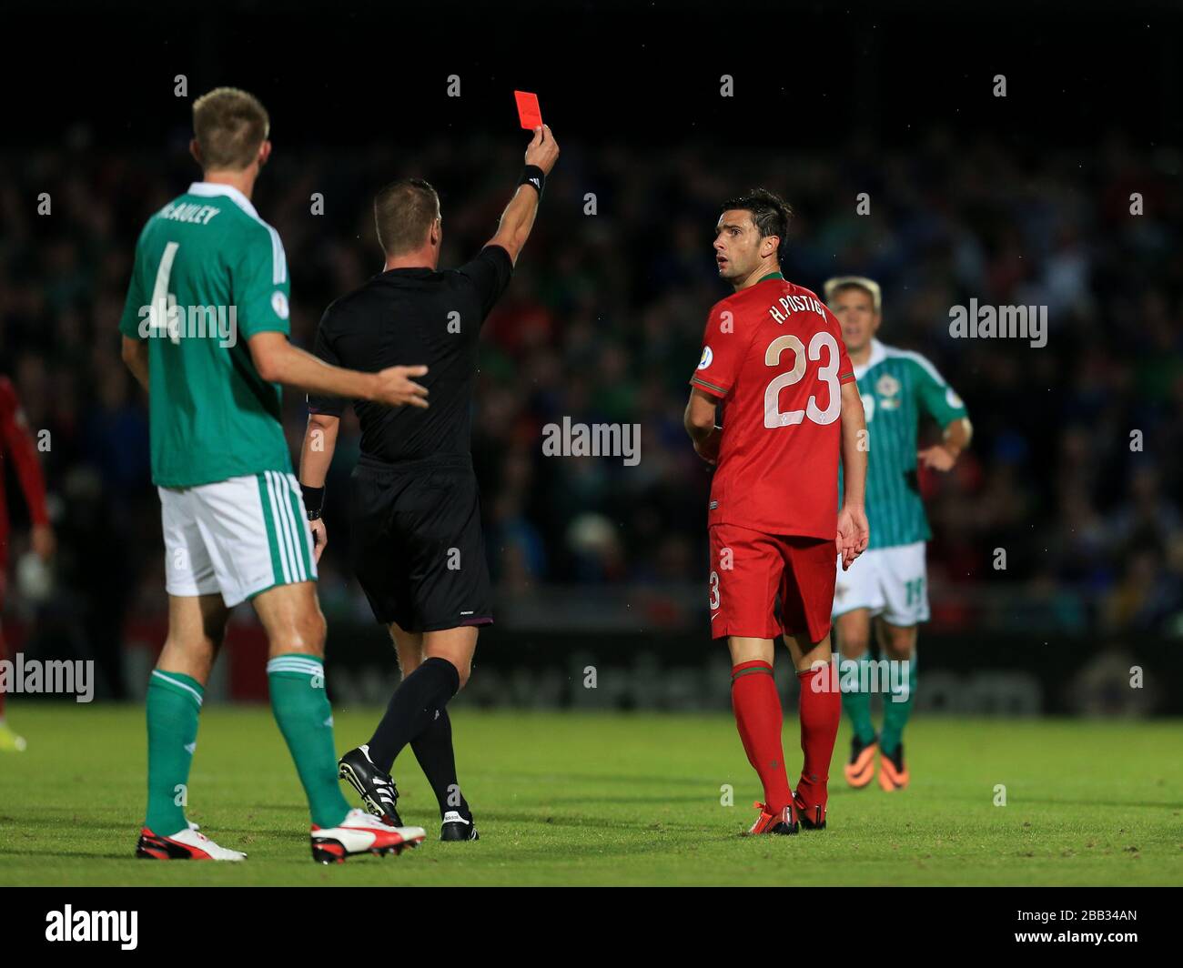 Portugal's Helder Postiga is shown a red card by referee Danny Makkelle. Stock Photo