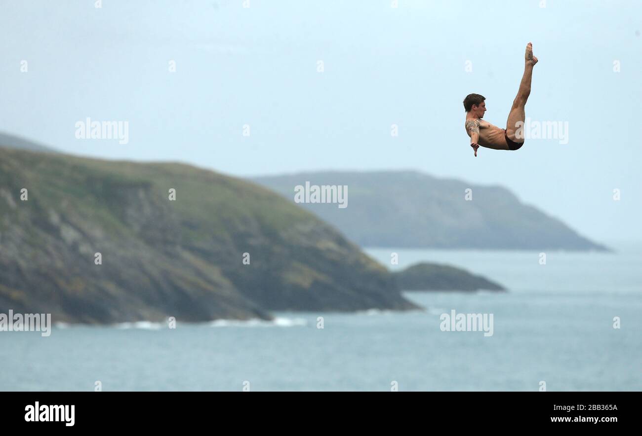 England's Matt Cowen during day one of the Red Bull Cliff Diving World Series at the Blue Lagoon in Abereiddy Stock Photo