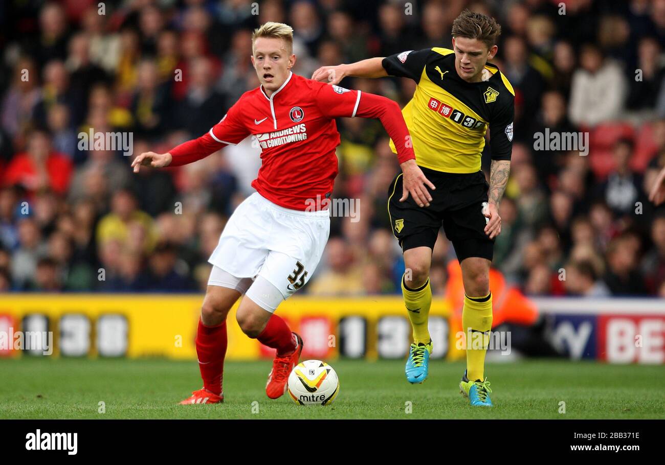 Watford's Sean Murray and Charlton Athletic's Joe Pigott compete for ...