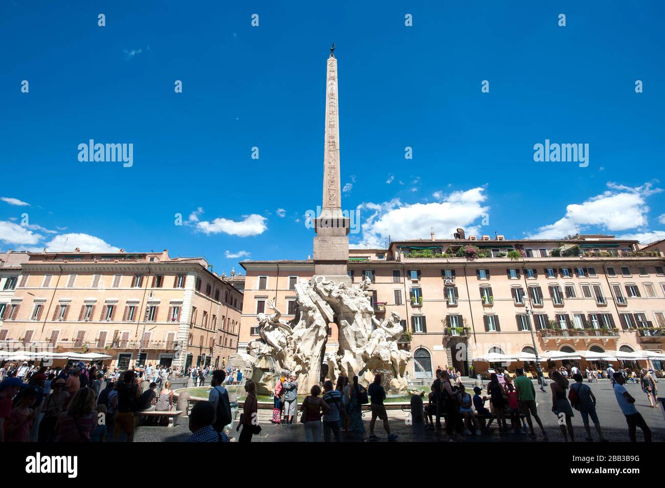 The Fountain of the Four Rivers (Fontana dei Quattro Fiumi) and egyptian obelisk in the Piazza Navona, Rome, Italy Stock Photo