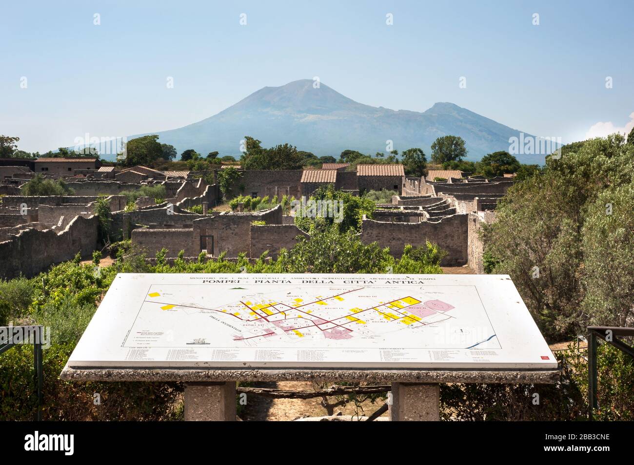 View of Mount Vesuvius beyond the ruined houses of Pompeii, Italy Stock Photo