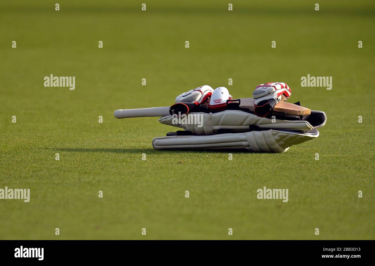 Pads, Bat and Cricket equipment on the pitch Stock Photo Alamy