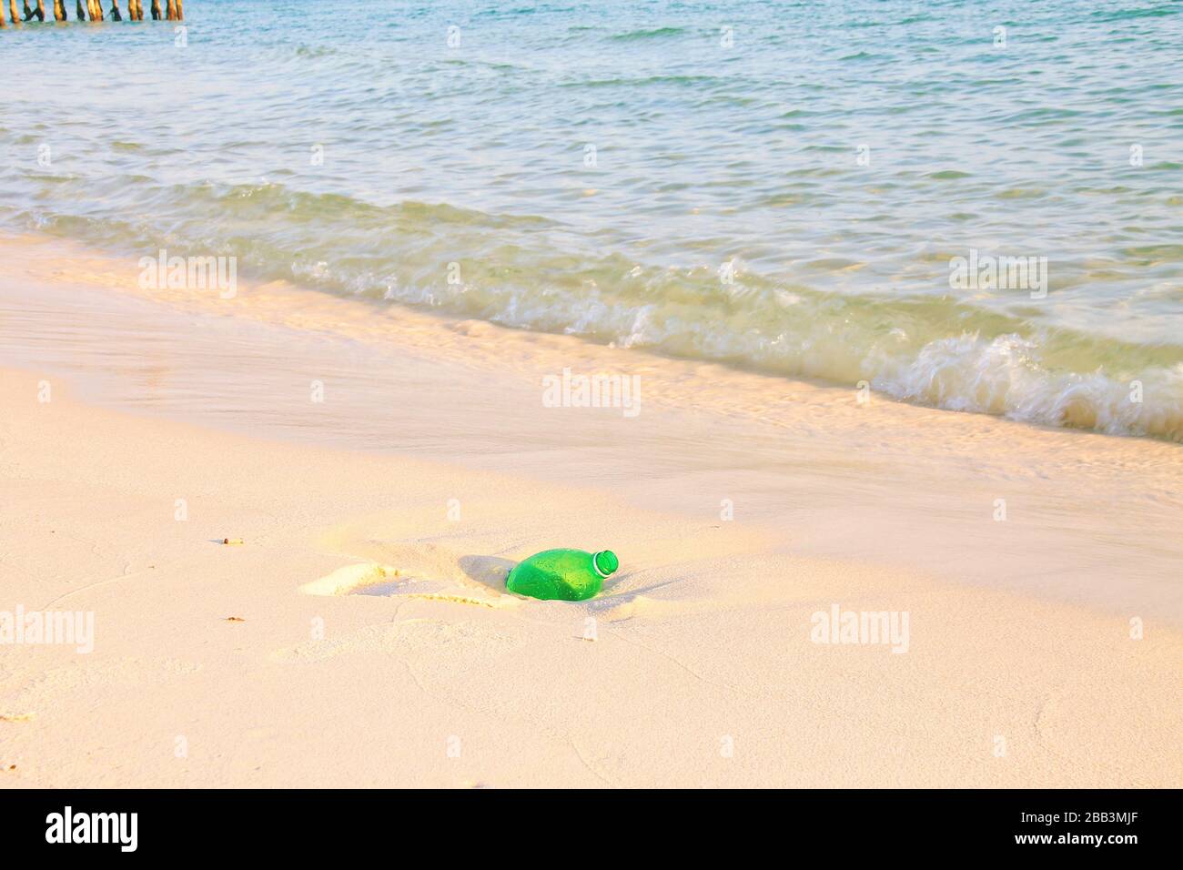 Garbage along the coast of Koh rong Island Soksan Beach in Cambodia that shows ocean pollution, environmental damage and human waste Stock Photo