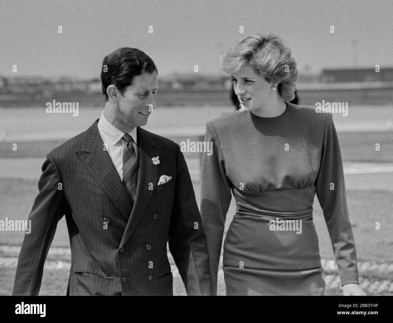 The Prince and Princess of Wales leaving London's Heathrow Airport in April 1987. Stock Photo