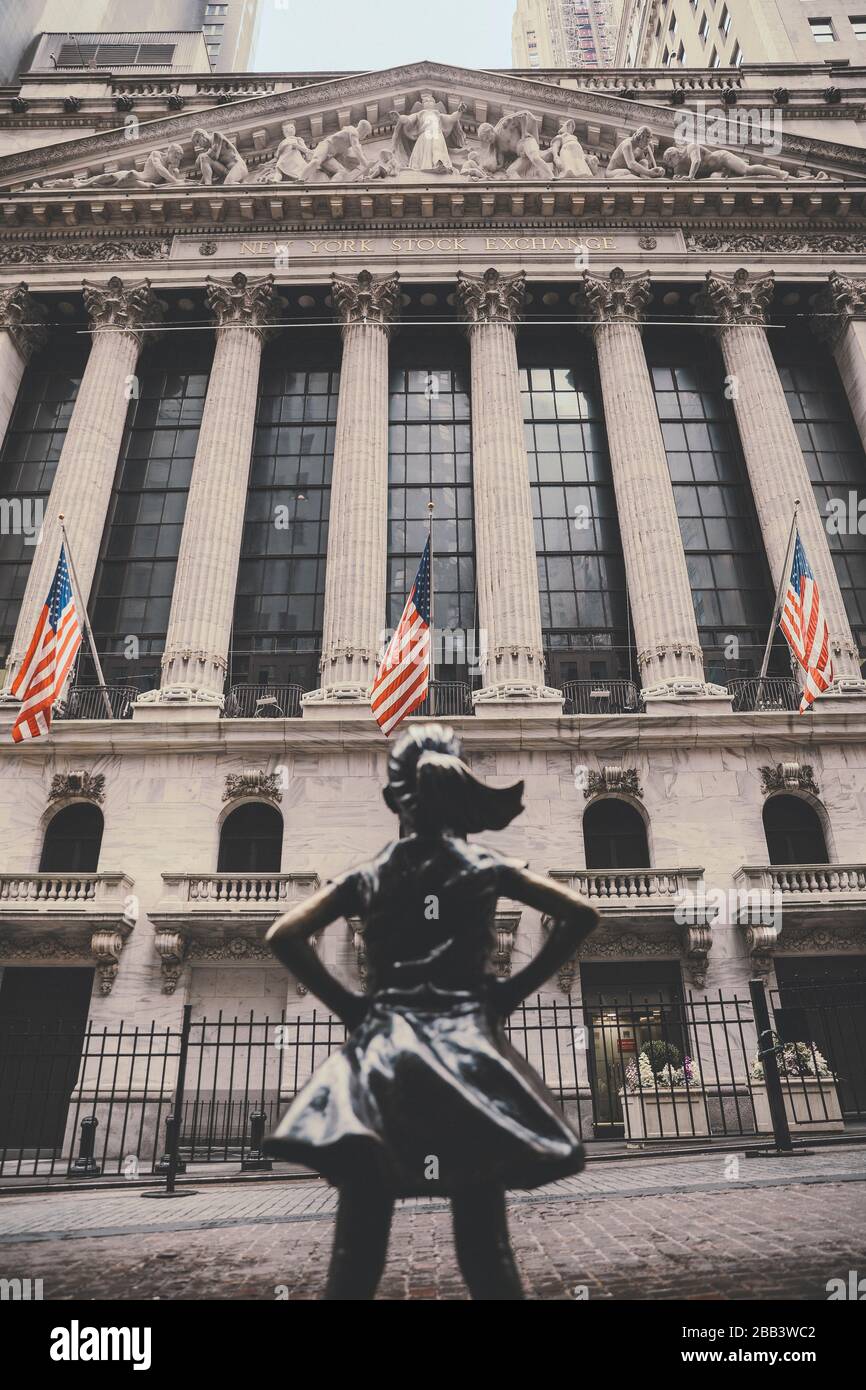 Fearless Girl Statue Outside The New York Stock Exchange Stock Photo