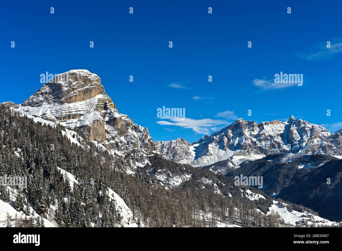 Winter landscape in the Dolomites near Covara, summits Sassongher, La Varella and Cunturines, Covara, Alta Badia, Dolomites, South Tyrol, Italy. Stock Photo