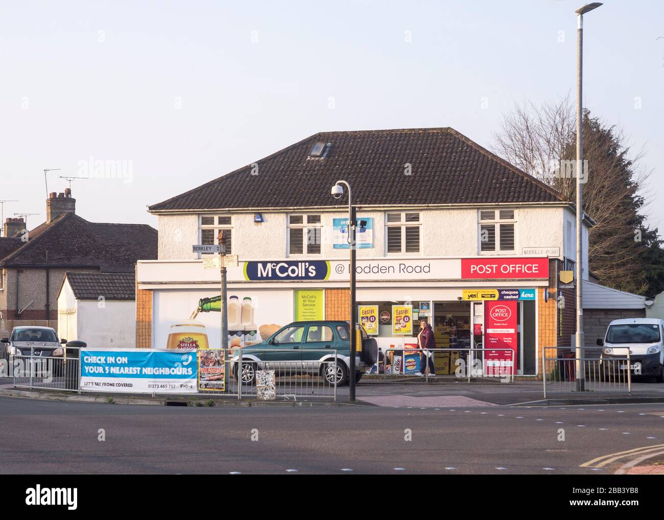 Look in on your 5 nearest neighbours sign outside a convenience store in Frome during the Covid-19 pandemic lockdown, March 2020. Stock Photo
