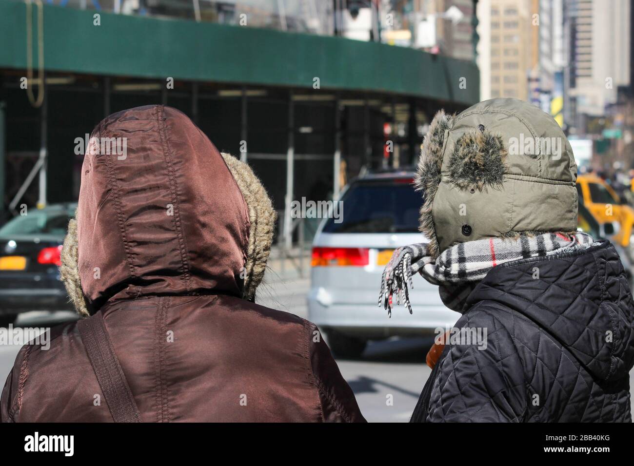 New Yorkers wearing winter clothes on a cold February day in Manhattan, New York City, United