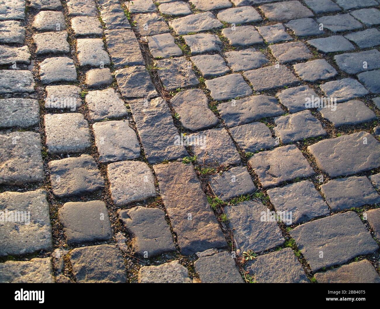 Old stone street in the sun background Stock Photo