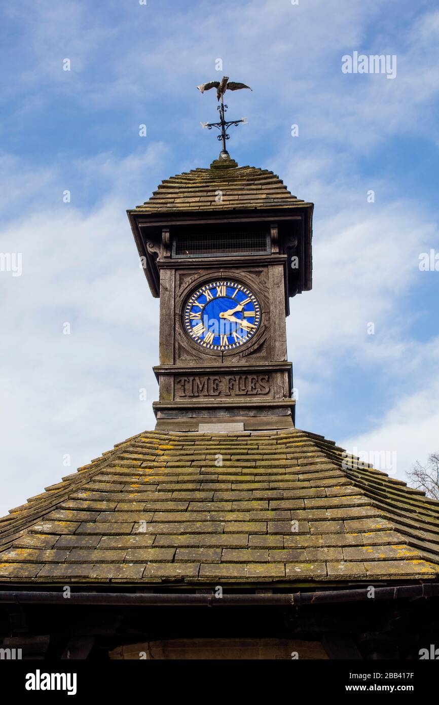Clock tower inscribed with Tempus Fugit (Time flies), erected in 1909, in the Broad Walk in Kensington Gardens, London, by a Mrs Galpin Stock Photo