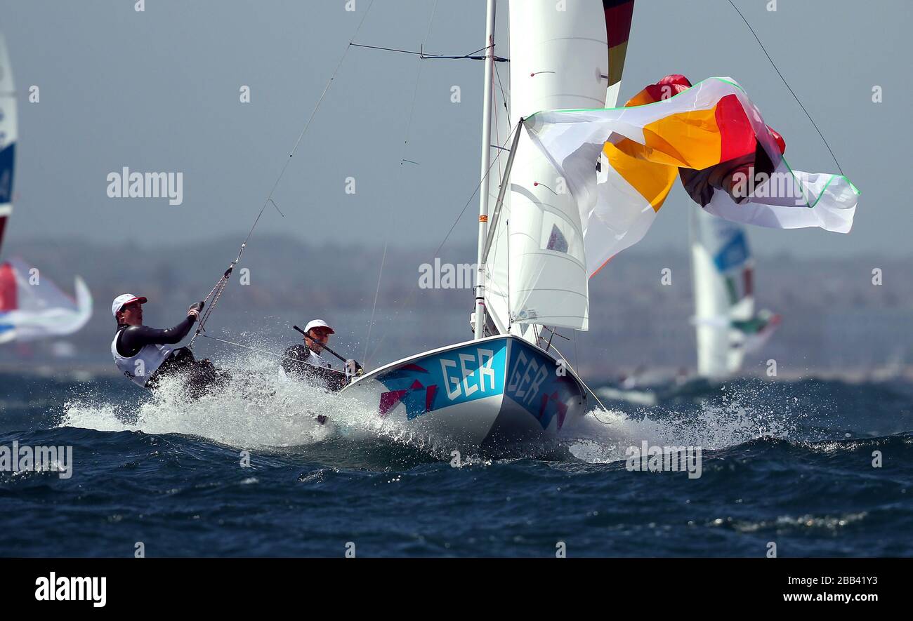 Germany's 470 crew Ferdinand Gerz and Patrick Follmann in high winds during the first day of their Olympic campaign off Weymouth today. Stock Photo