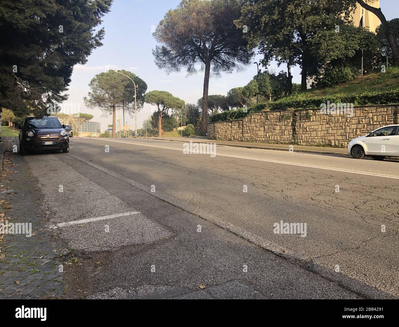 ROME, ITALY - MARCH 29, 2020: A view of a street during quarantine amid the COVID-19 pandemic. On March 8, 2020, the Italian government ordered to close all the museums, archeological sites and cultural institutions; starting from March 12, the country is on full lockdown with all shops, bars and restaurants closed, except for grocery stores and pharmacies. Walking outside is prohibited with certain exceptions. Vera Shcherbakova/TASS Stock Photo