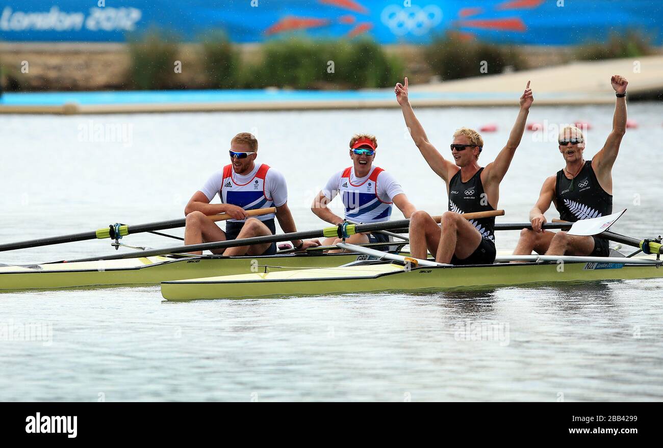 New Zealand's Hamish Bond (centre right) and Eric Murray celebrate winning gold ahead of Great Britain's  the final of the men's pair at Eton Dorney Rowing Lake, Windsor on day seven of the London 2012 Olympic Games. Stock Photo