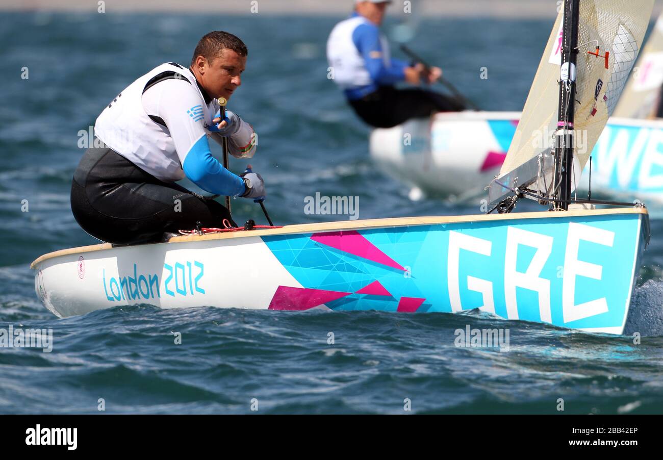 Greece's Finn sailor Ioannis Mitakis during the tenth race of his Olympic  campaign off Weymouth today Stock Photo - Alamy