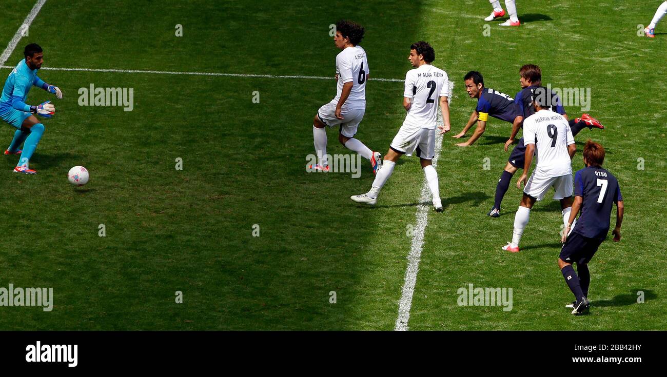 Japan's Maya Yoshida scores the second goal of the match against Egypt during Men's Quarter Final match at Old Trafford, Manchester. Stock Photo
