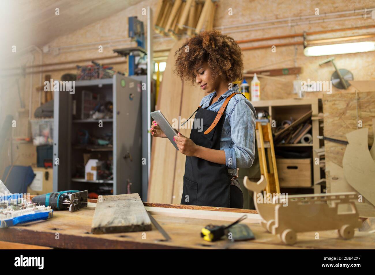 African woman working hi-res stock photography and images - Alamy
