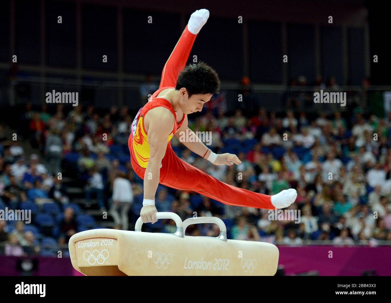 China's Kai Zou competes on the pommel horse during the Artistic ...