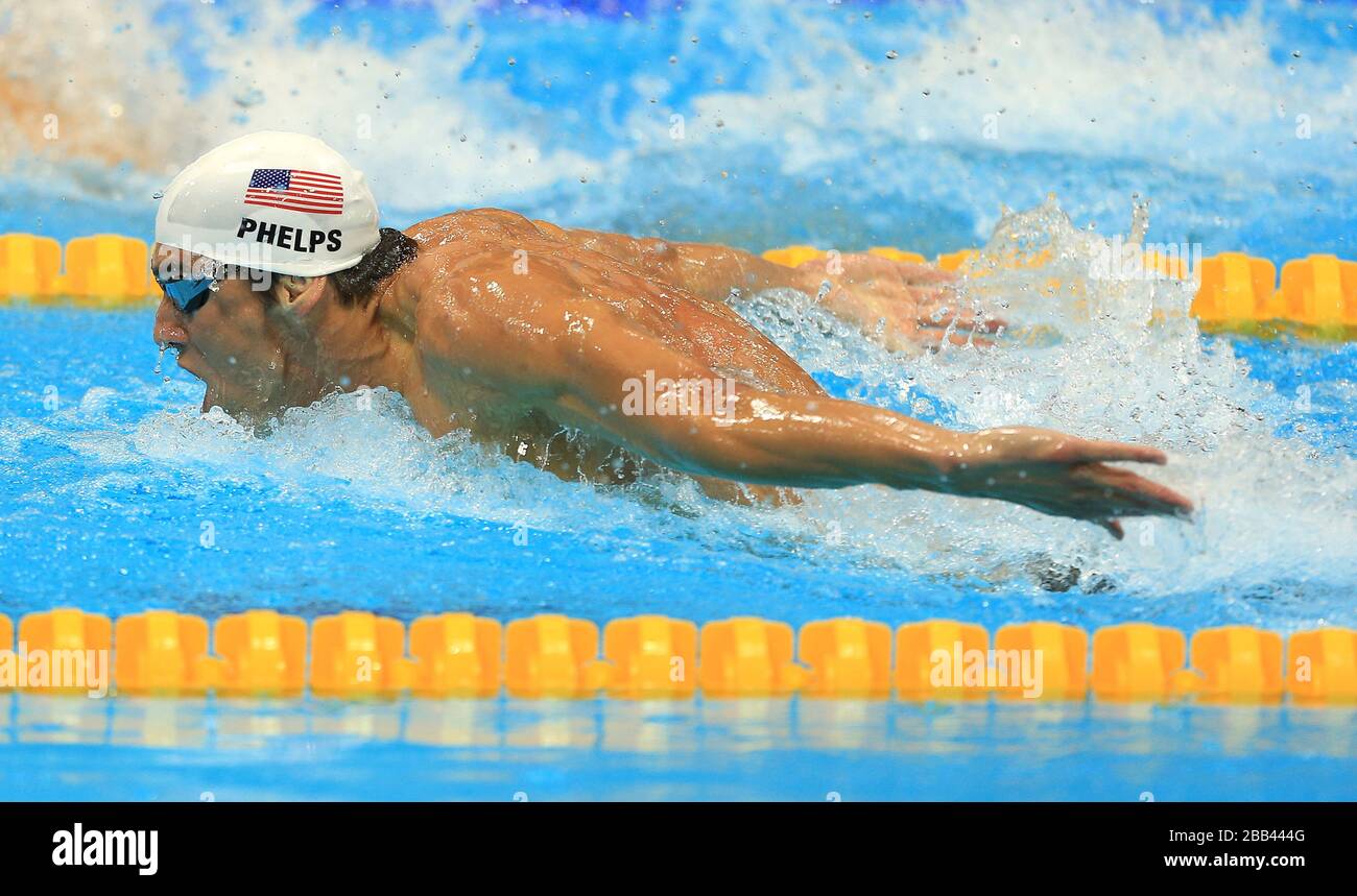 USA's Michael Phelps competes in the Men's 200m Butterfly Heats at the