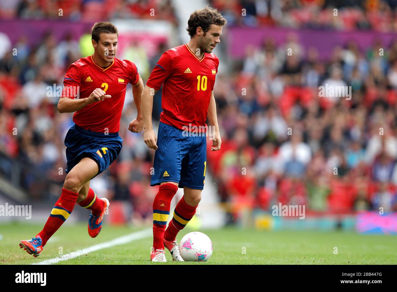 Spain's Juan Mata (right) combines with team-mate Cesar Azpilicueta Stock Photo
