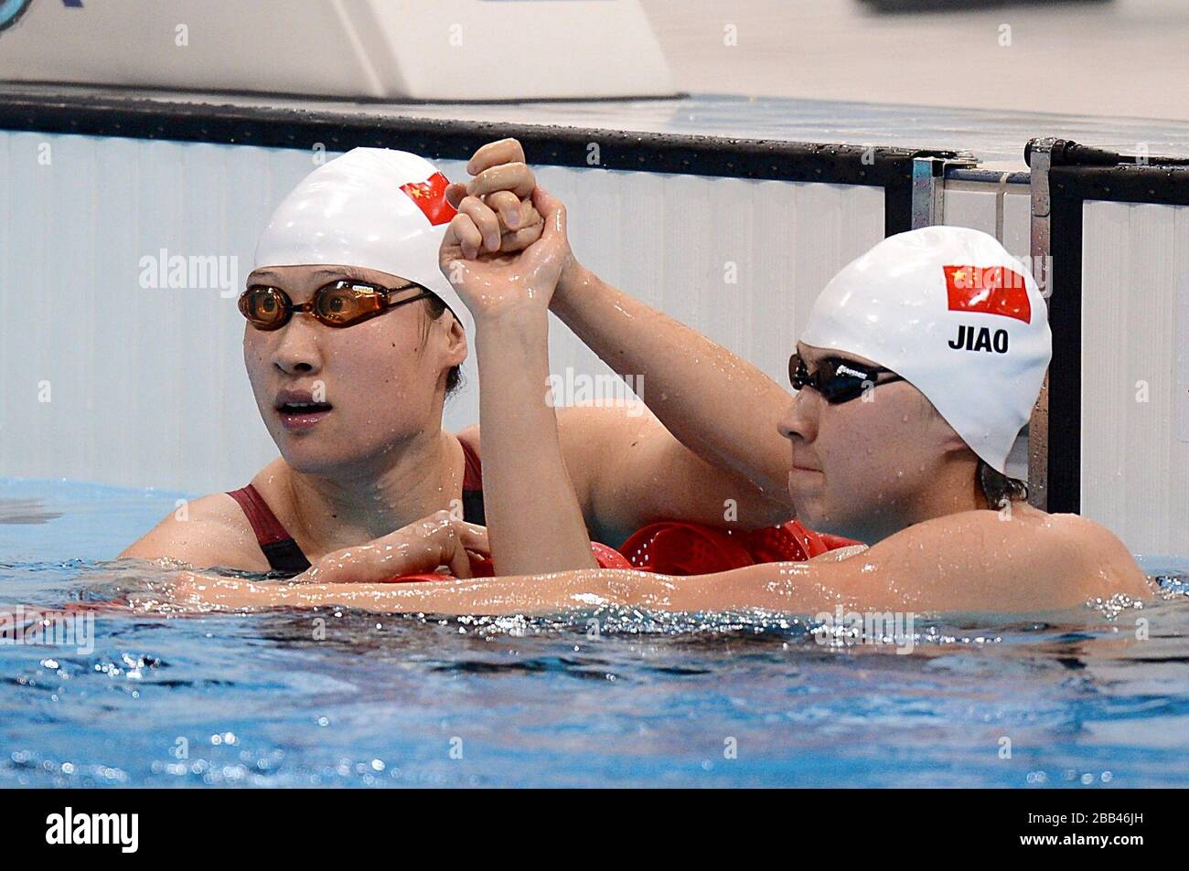 china-s-liuyang-jiao-right-celebrates-winning-gold-in-the-women-s