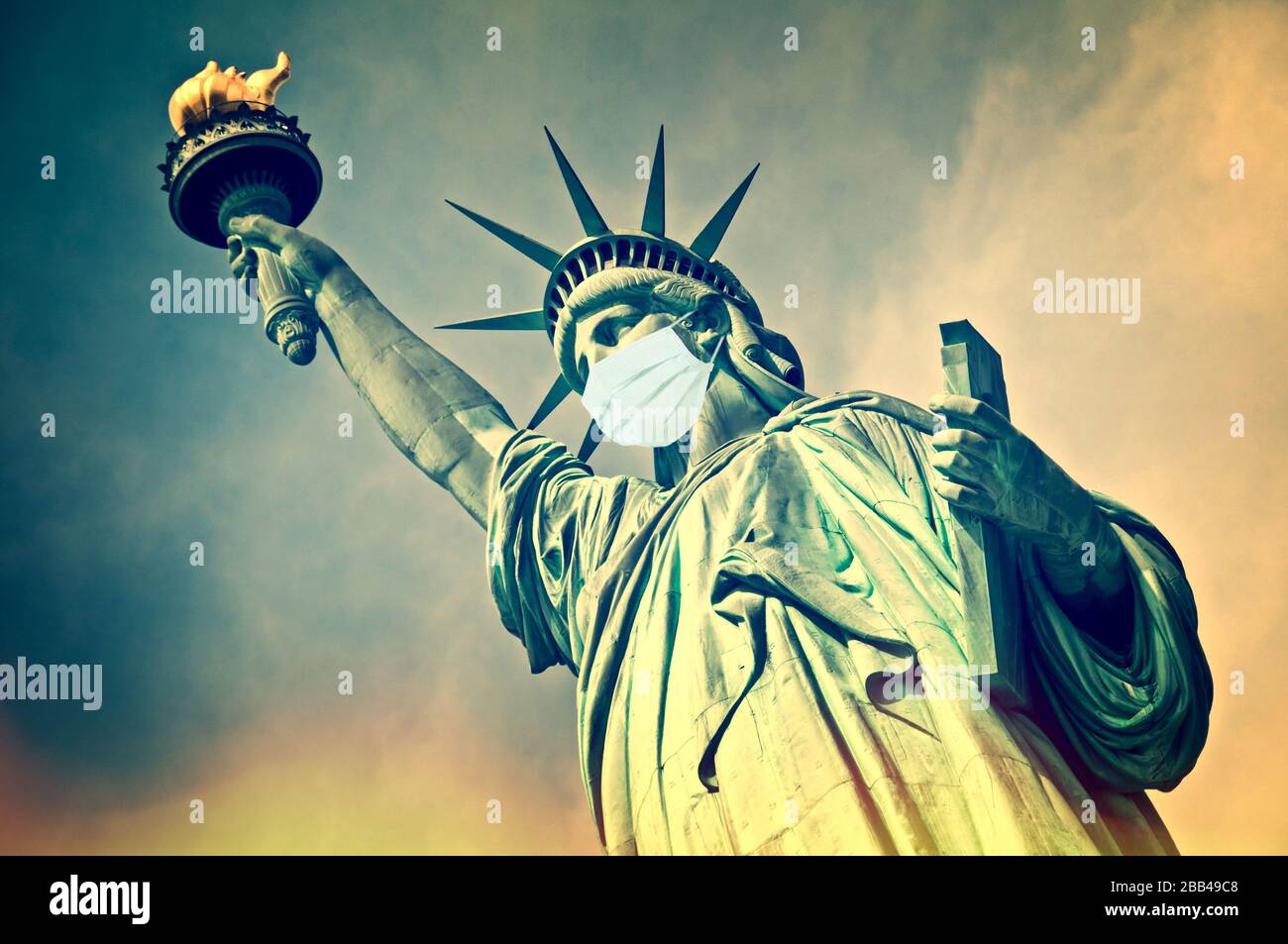 Statue of Liberty wearing a surgical mask. New coronavirus, covid-19 in New York and USA epidemic crisis concept Stock Photo