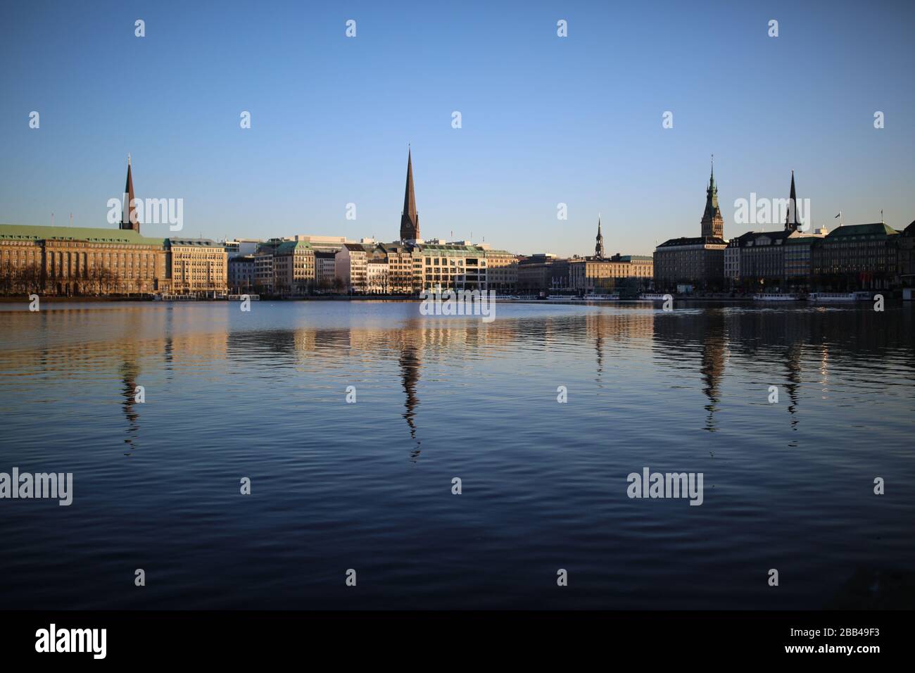 The Binnenalster Lake, Or The Inner Alster Lake, In Hamburg, Germany, with the Jungfernstieg and Rathaus In The Background Stock Photo
