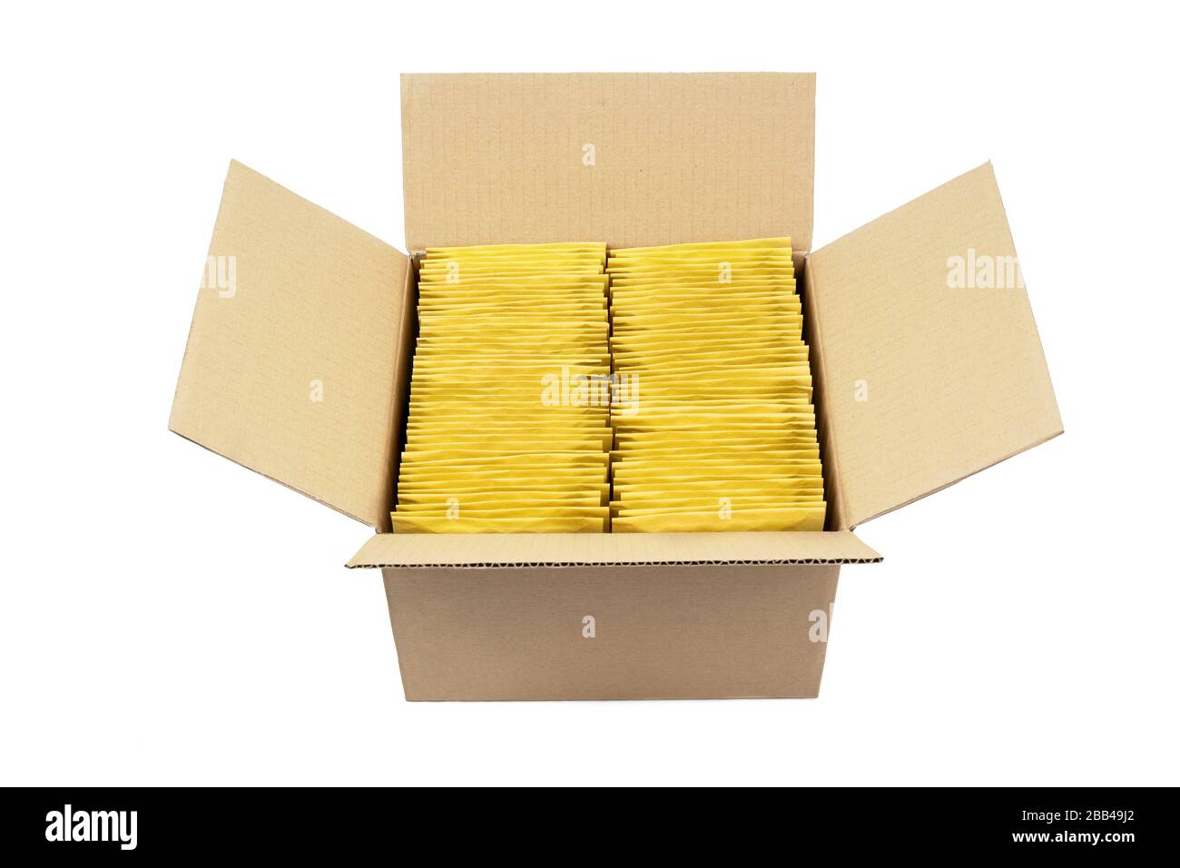 Lot of yellow bubble envelopes inside an opened cardboard box isolated