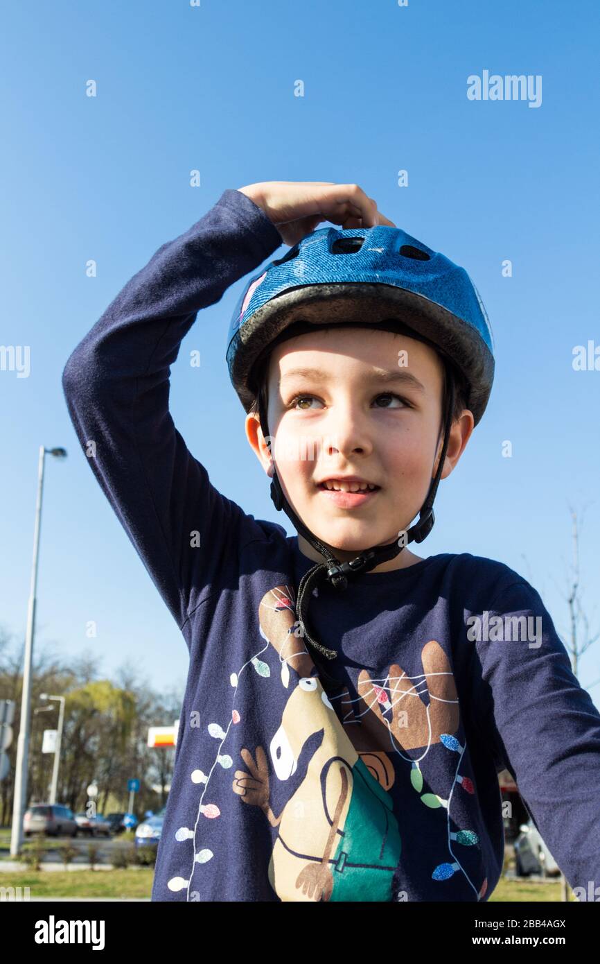 Boy child kid wearing safety helmet Stock Photo Alamy