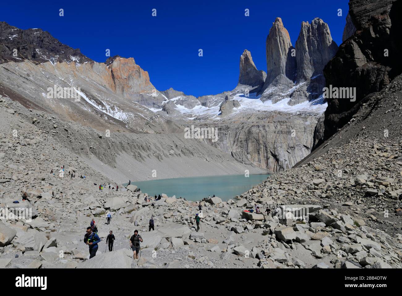 Walkers at the Three Towers, Torres de Paine National Park, Magallanes Region, Patagonia, Chile, South America Stock Photo