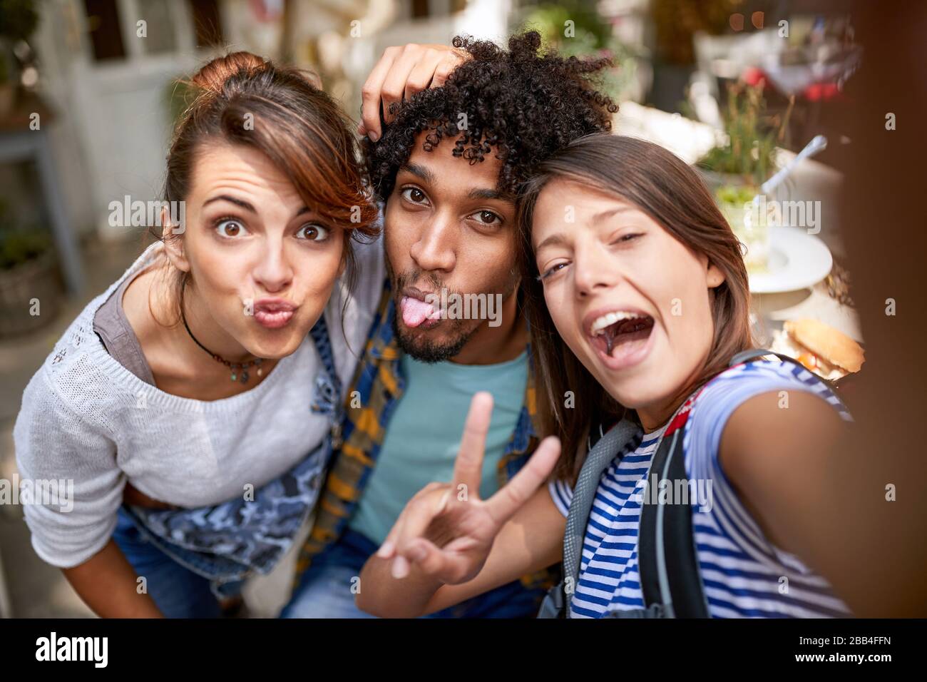 Afro-American male with female makes funny face Stock Photo