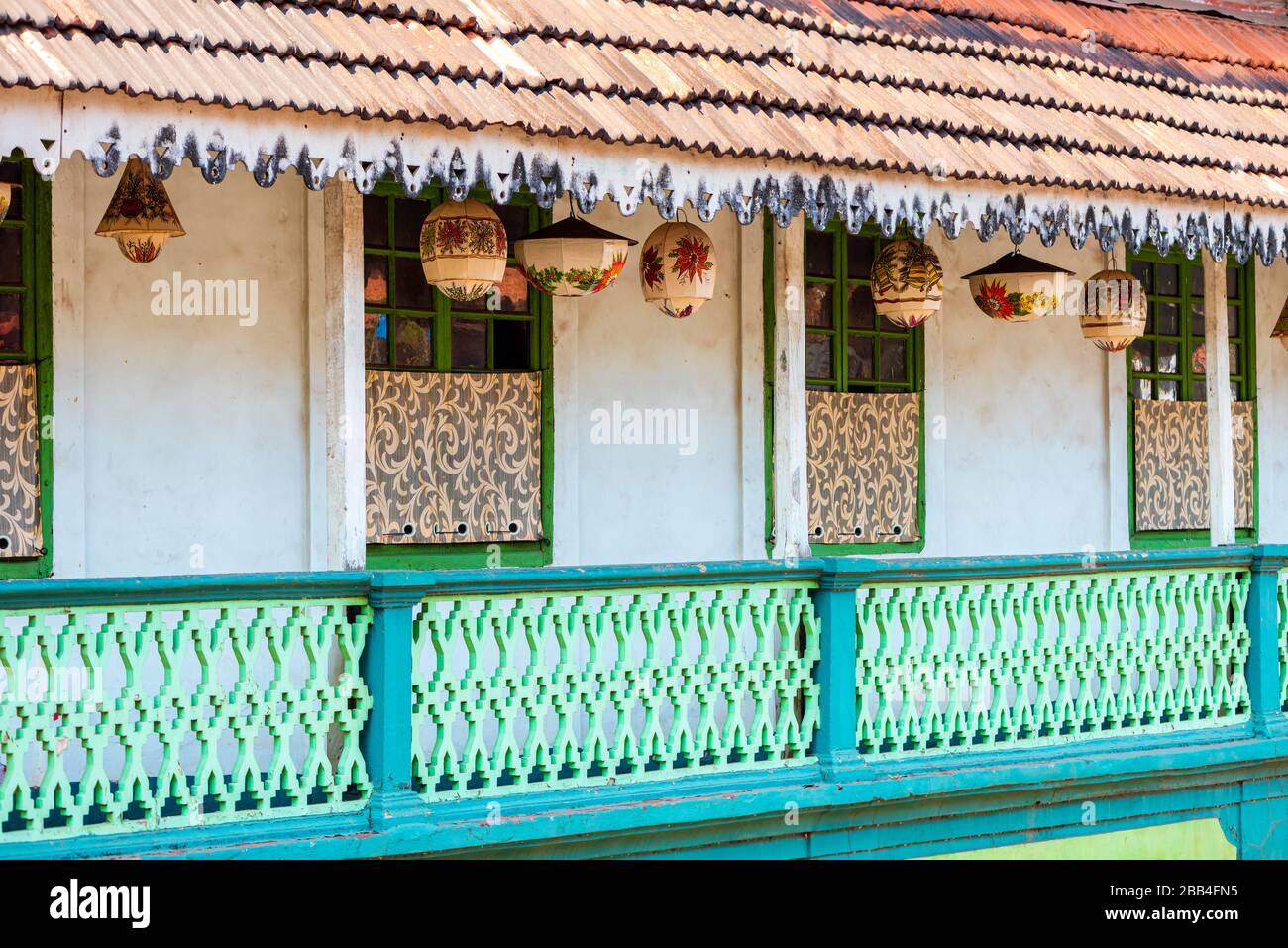 Old post-colonial buildings Goa in Margao charming facades ornate walls moldy walls columns balustrades balusters and railings trip to Catholic India Stock Photo