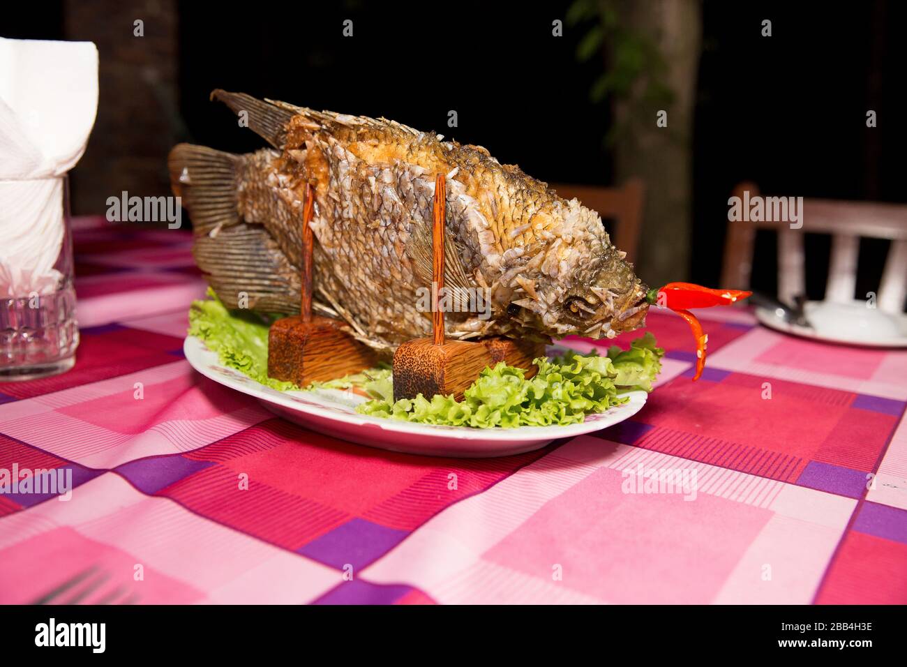 A whole Vietnamese fried fish Stock Photo Alamy