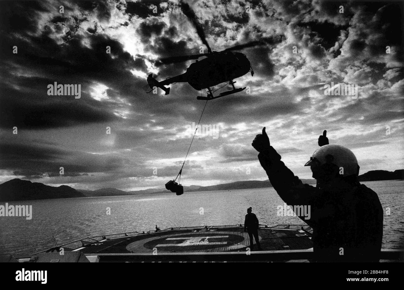 A supply helicopter takes off from the MV Pharos with supplies for the lighthouse on the uninhabited island of Hyskeir, eight miles from Rum in the Inner Hebrides on Scotland's west coast. The helicopter was delivering supplies to workmen who were converting the lighthouse from manned to automatic. The lighthouse was operated by the Northern Lighthouse Board and was one of the last in Scotland to be automated. Stock Photo