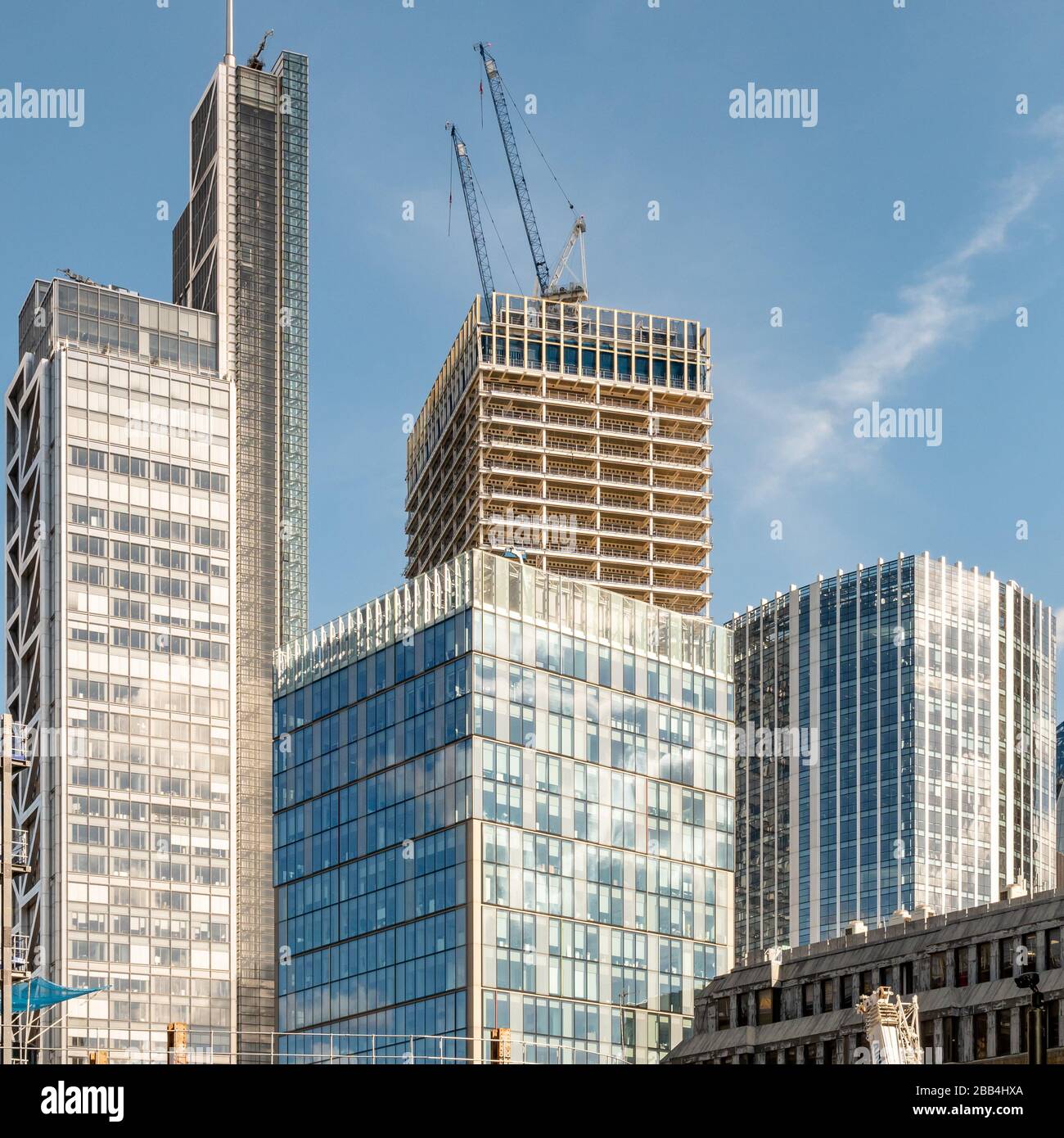 Skyscraper construction, City of London. A modern skyscraper under construction rising out of the heart of the UK capital's financial district. Stock Photo