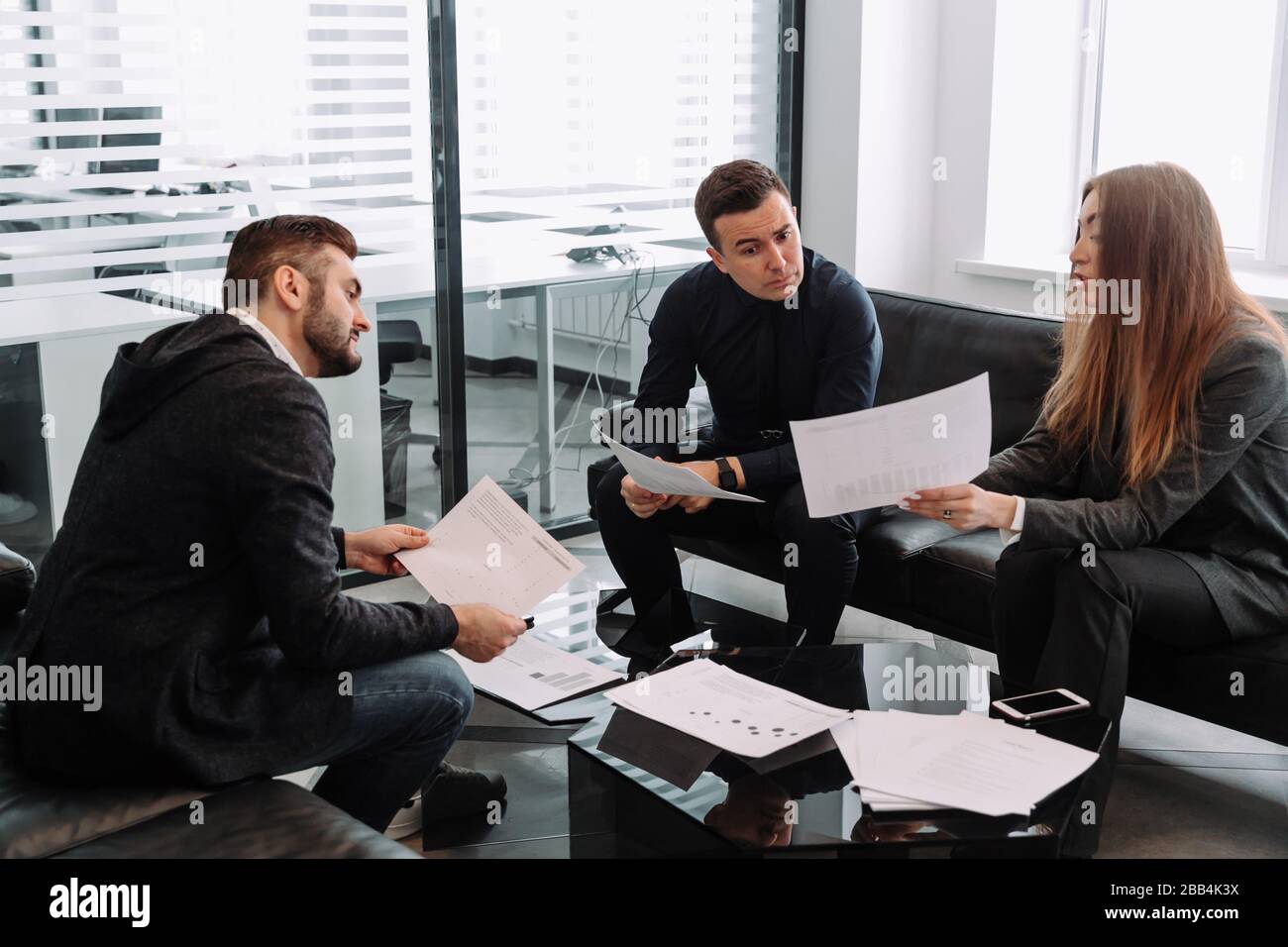 Group of successful business people at work in office Stock Photo - Alamy