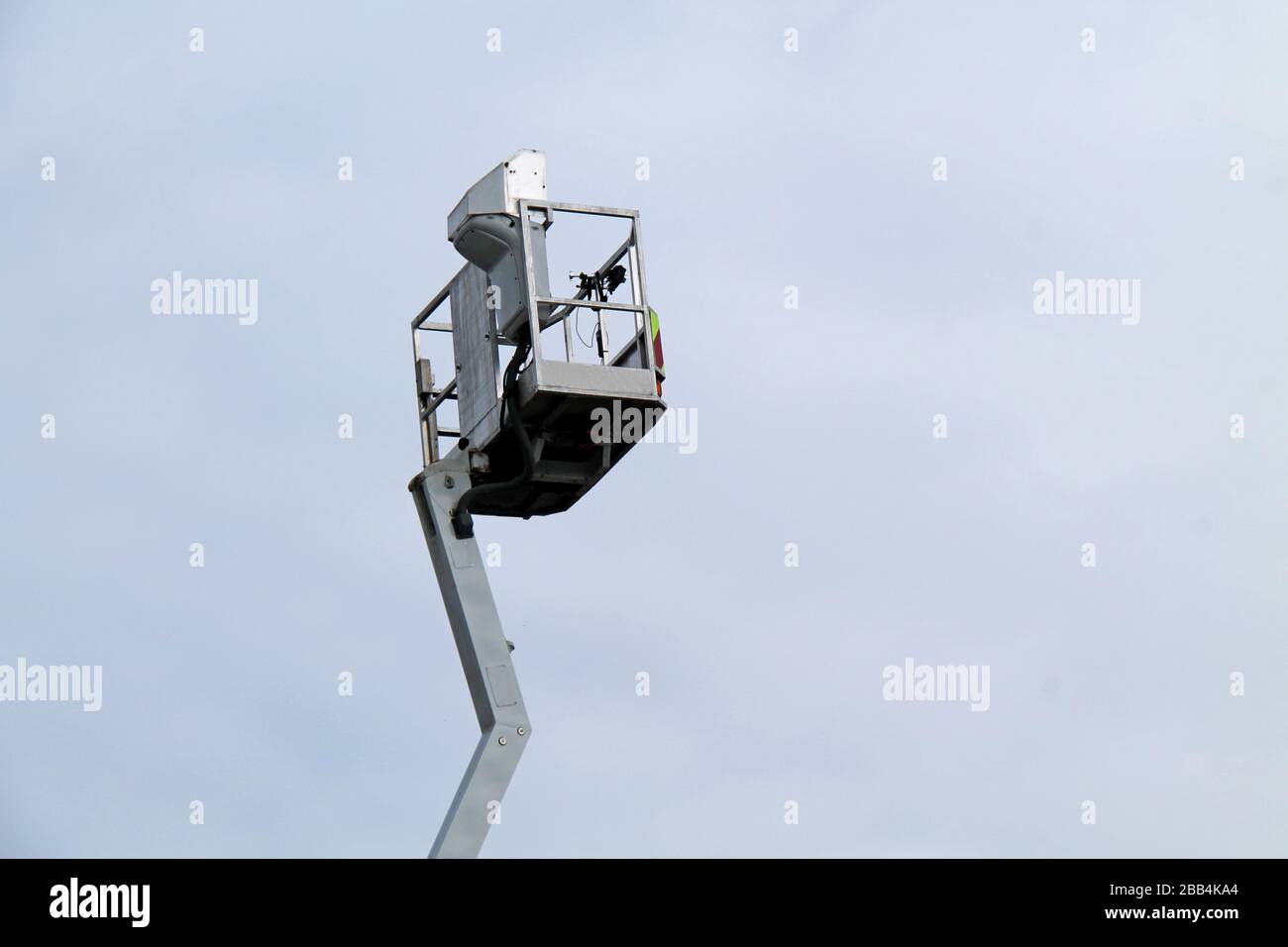 The Cage at the Top of a High Lift Cherry Picker Crane. Stock Photo