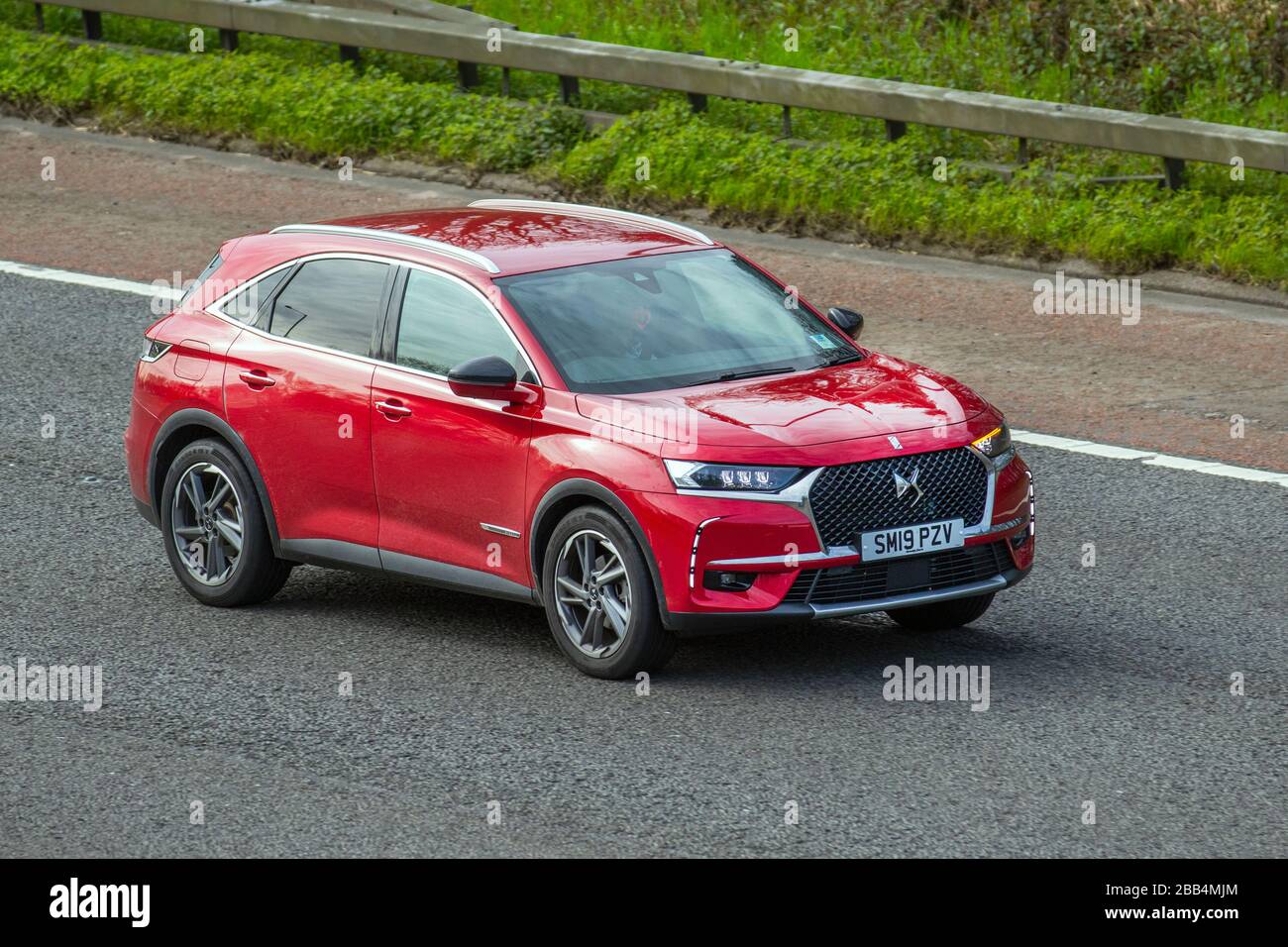 2019 red Ds DS7 Crossback Prestige Ptch; Vehicular traffic moving vehicles, vehicle driving, roads, motors, motoring  on the M6 motorway highway Stock Photo