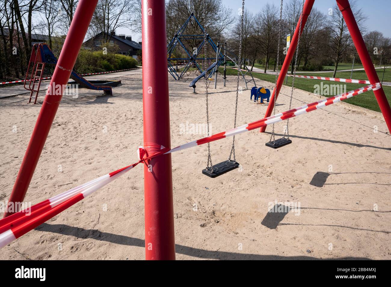Safety measures: A children's playground is closed to avoid spreading of the virus / covid-19 disease during coronavirus pandemic Stock Photo